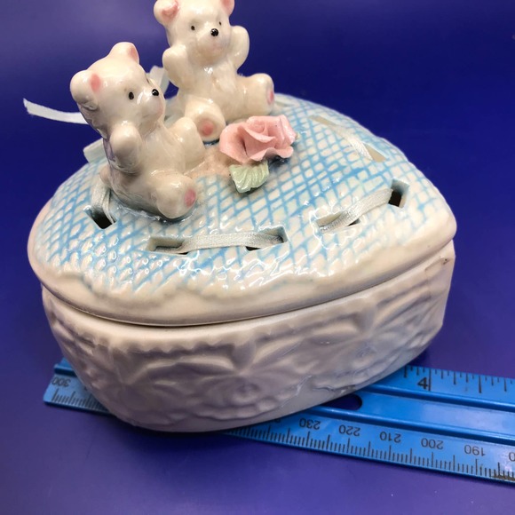 Porcelain Heart Trinket Box  2 Bears + Rose atop a blue quilt with ribbon trim. - Picture 11 of 13